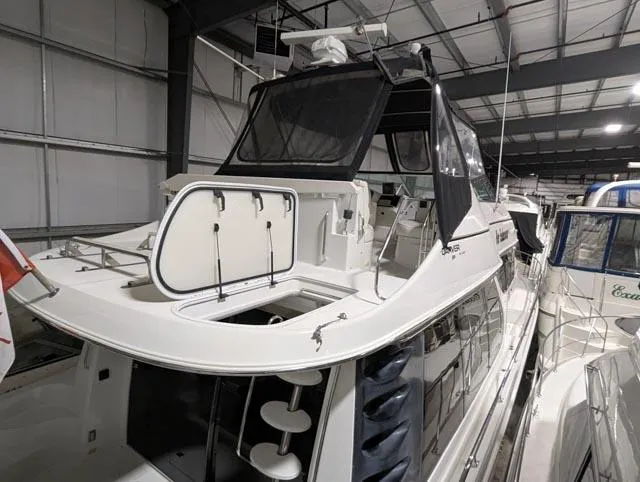 Her Endeavour II Yacht Photos Pics 1999 Carver 530 Voyager Pilothouse yacht in indoor storage facility.