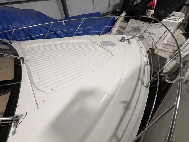 Her Endeavour II Yacht Photos Pics 1999 Carver 530 Voyager Pilothouse yacht deck with railing in storage.