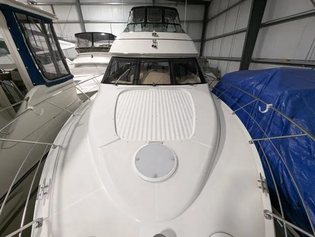 Her Endeavour II Yacht Photos Pics 1999 Carver 530 Voyager Pilothouse yacht in storage, viewed from the bow.