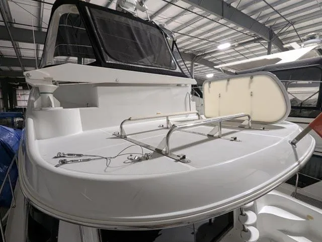 Her Endeavour II Yacht Photos Pics 1999 Carver 530 Voyager Pilothouse yacht in indoor storage facility.