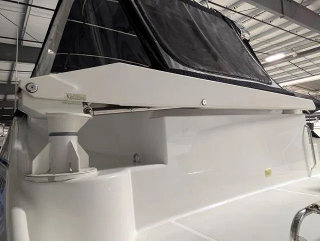 Her Endeavour II Yacht Photos Pics 1999 Carver 530 Voyager Pilothouse yacht in a covered storage facility.