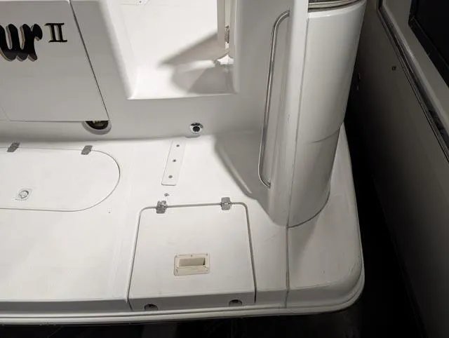 Her Endeavour II Yacht Photos Pics 1999 Carver 530 Voyager Pilothouse deck with storage compartments and clean white finish.