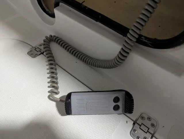 Her Endeavour II Yacht Photos Pics Remote control on a 1999 Carver 530 Voyager Pilothouse boat, coiled cord attached.