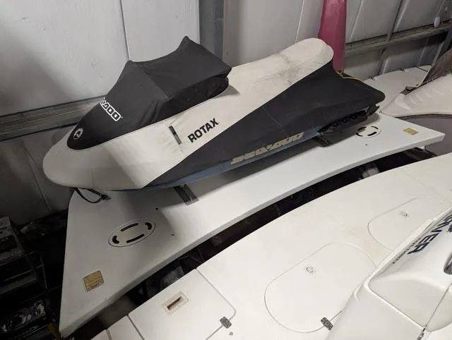 Her Endeavour II Yacht Photos Pics 1999 Carver 530 Voyager Pilothouse with covered Sea-Doo jet ski on deck.