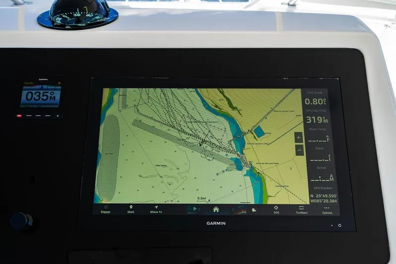 Reel Southern Yacht Photos Pics Navigation display on a 2006 Viking 56 Convertible yacht, featuring a Garmin GPS map.