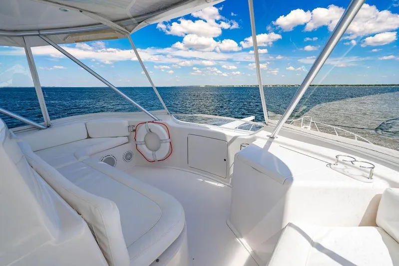 Reel Southern Yacht Photos Pics Luxurious 2006 Viking 56 Convertible yacht interior with ocean view and clear blue sky.