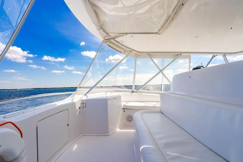 Reel Southern Yacht Photos Pics Luxurious 2006 Viking 56 Convertible yacht interior with ocean view and clear blue sky.