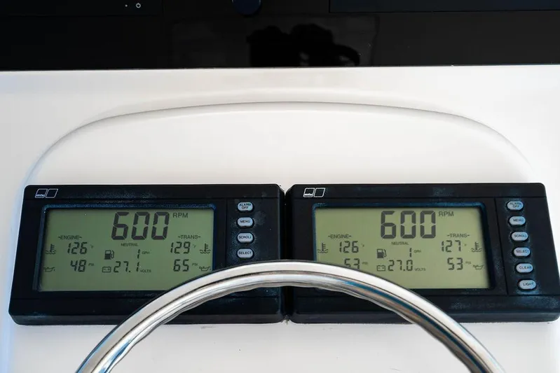 Reel Southern Yacht Photos Pics Digital engine displays on a 2006 Viking 56 Convertible yacht dashboard.