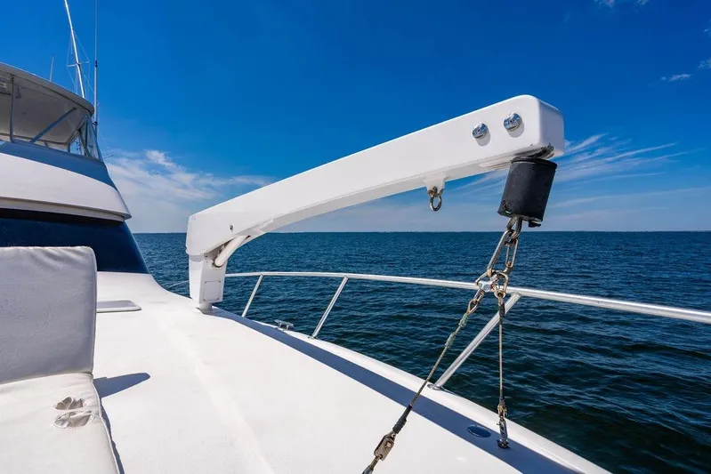Reel Southern Yacht Photos Pics 2006 Viking 56 Convertible yacht deck with ocean view under clear blue sky.
