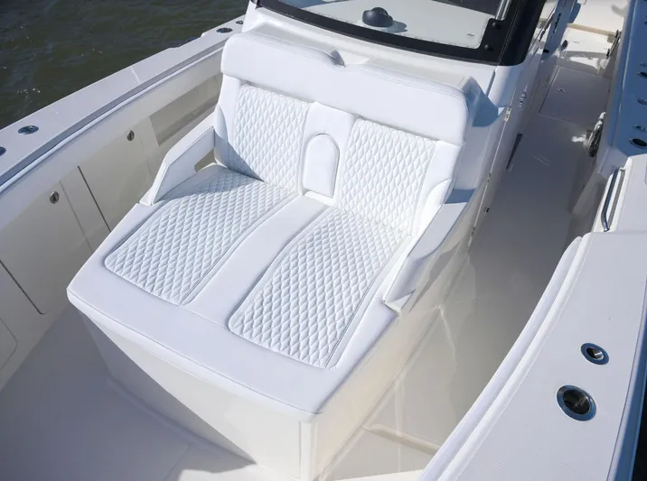  Yacht Photos Pics Luxurious seating on 2025 Solace 37 CS boat with diamond-pattern upholstery.