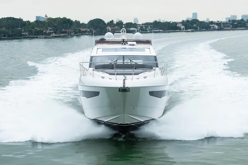 Cinderella Yacht Photos Pics 2017 Princess S65 yacht cruising on a serene waterway.