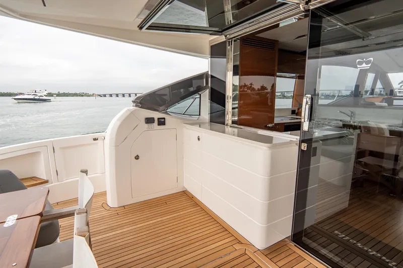 Cinderella Yacht Photos Pics Luxurious 2017 Princess S65 yacht deck with sleek design and wooden flooring.
