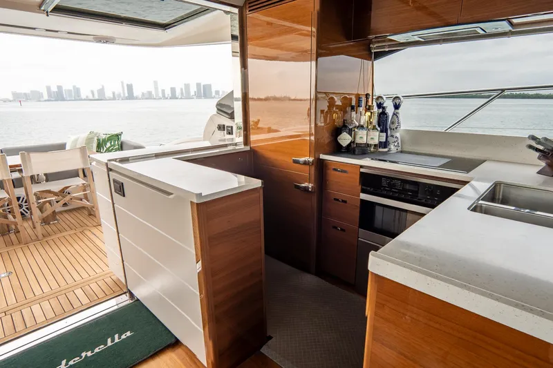 Cinderella Yacht Photos Pics Luxurious 2017 Princess S65 yacht interior with modern kitchen and ocean view.