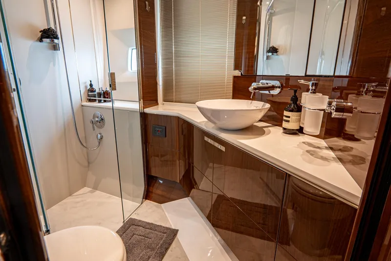 Cinderella Yacht Photos Pics Luxurious bathroom in 2017 Princess S65 yacht, featuring modern fixtures and elegant design.