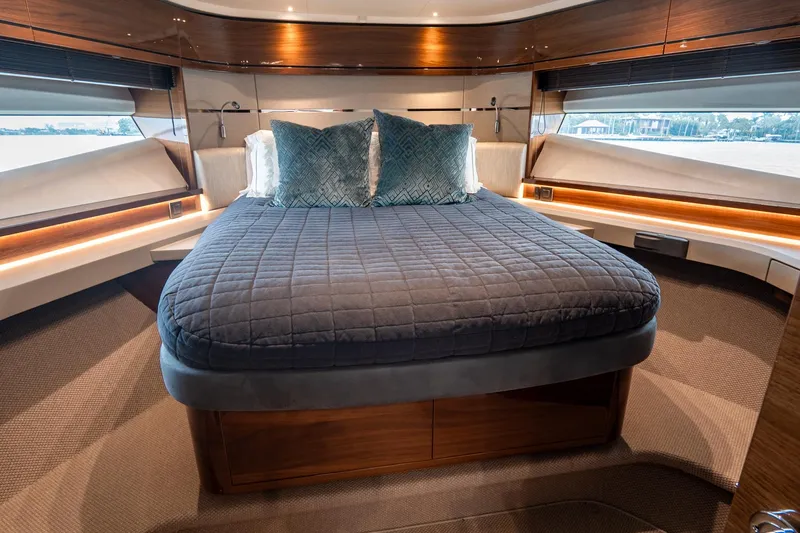 Cinderella Yacht Photos Pics Luxurious 2017 Princess S65 yacht bedroom with elegant bedding and ambient lighting.