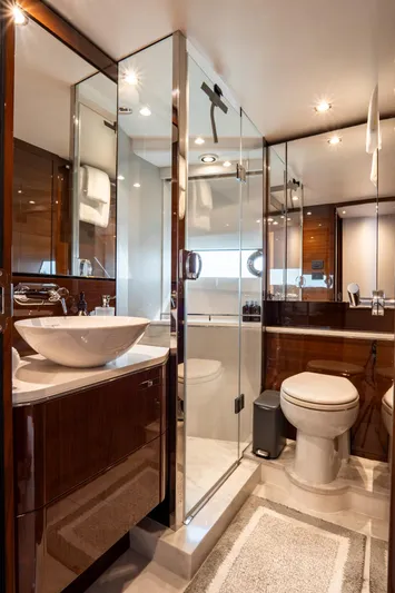 Cinderella Yacht Photos Pics Luxurious bathroom in 2017 Princess S65 yacht with modern fixtures and elegant design.