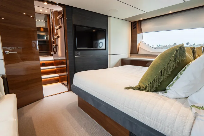 Cinderella Yacht Photos Pics Luxurious interior of 2017 Princess S65 yacht with elegant bedroom and modern amenities.