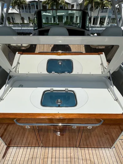  Yacht Photos Pics 2016 Chris-Craft Catalina 34 boat with a sleek onboard sink and storage area.