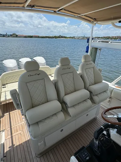  Yacht Photos Pics 2016 Chris-Craft Catalina 34 boat interior with luxurious seating and scenic water view.