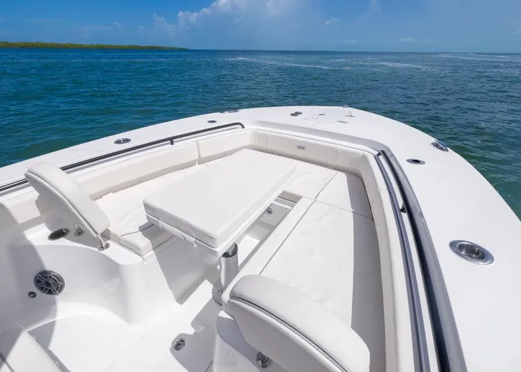  Yacht Photos Pics 2026 Sea Hunt Gamefish 27 Forward Seating boat on open water, featuring spacious seating area.