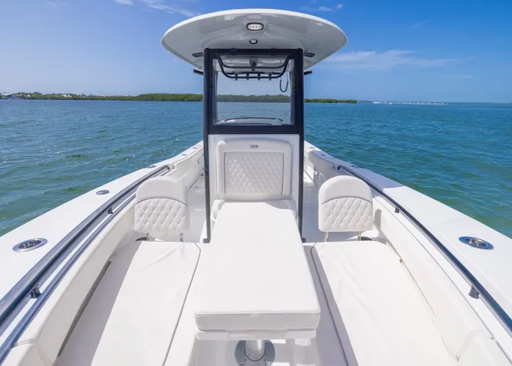 Yacht Photos Pics 2026 Sea Hunt Gamefish 27 Forward Seating boat on calm blue water.