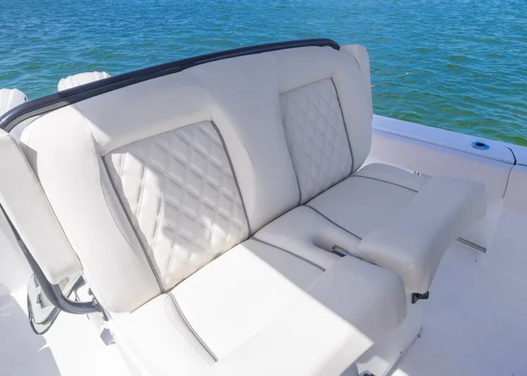  Yacht Photos Pics Luxurious seating on 2026 Sea Hunt Gamefish 27 boat, featuring elegant white upholstery.