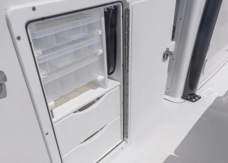  Yacht Photos Pics Storage compartment on 2026 Sea Hunt Gamefish 27 boat with tackle boxes and drawers.