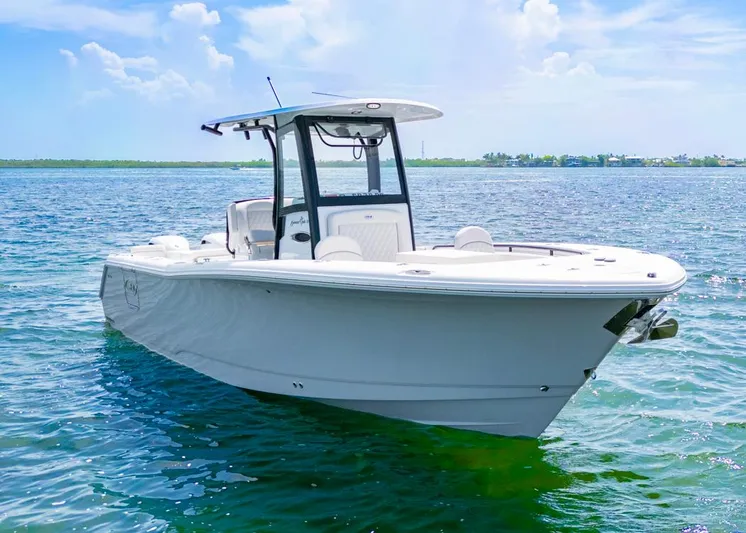  Yacht Photos Pics 2026 Sea Hunt Gamefish 27 Forward Seating boat on calm blue water.