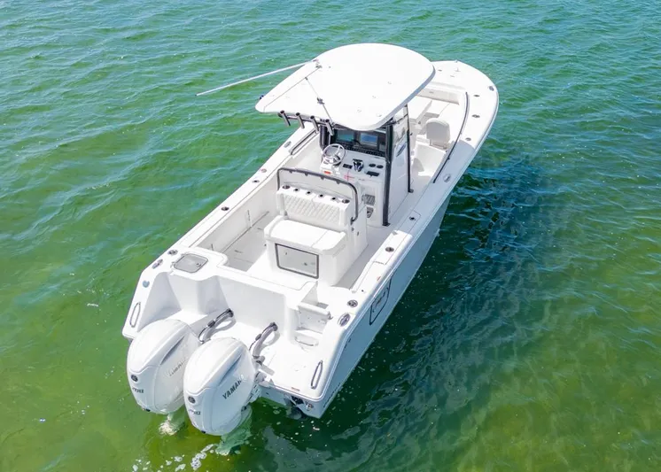  Yacht Photos Pics 2026 Sea Hunt Gamefish 27 boat with forward seating on clear water.