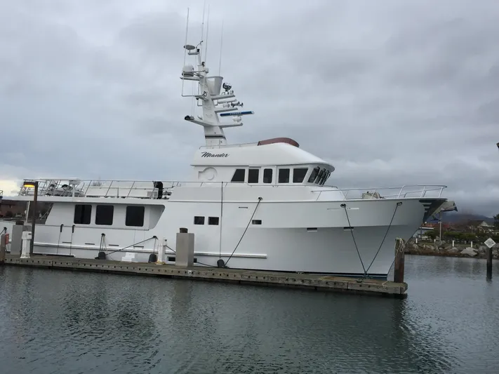 Meander Yacht Photos Pics 2003 Northern Marine Pilothouse Trawler docked under cloudy skies.