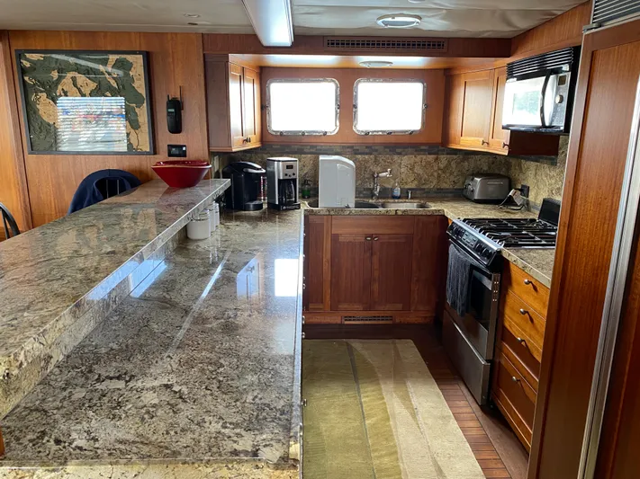 Meander Yacht Photos Pics Kitchen in a 2003 Northern Marine Pilothouse Trawler yacht.