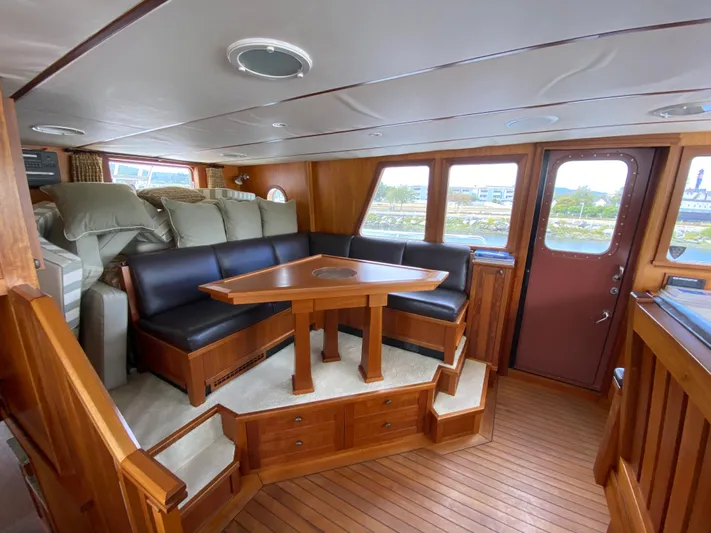 Meander Yacht Photos Pics Interior of a 2003 Northern Marine Pilothouse Trawler with wooden furnishings.