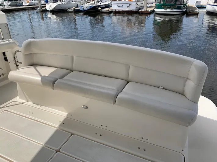 Sparrow Yacht Photos Pics White seating on 1995 Tiara Yachts 4000 Express, docked at marina.