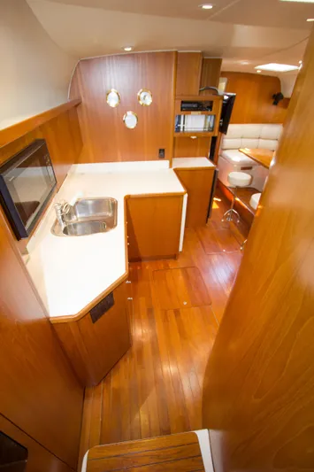 Sparrow Yacht Photos Pics Interior of 1995 Tiara Yachts 4000 Express with wood finish and modern amenities.