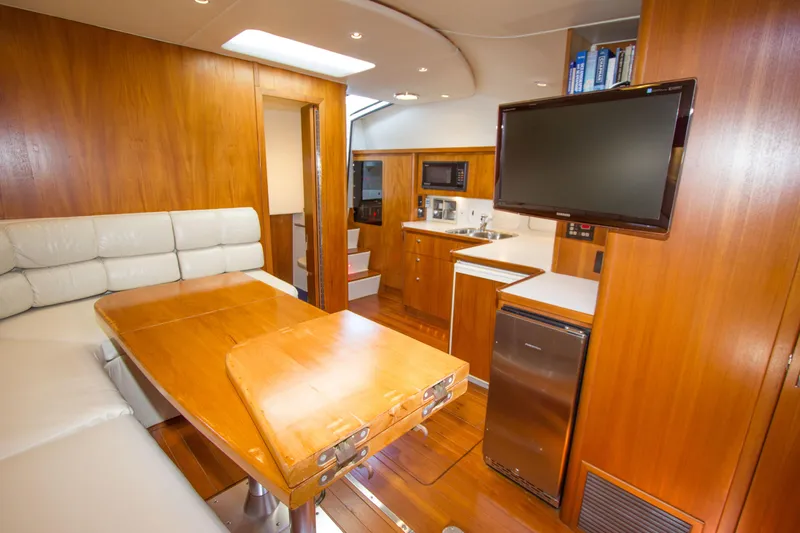 Sparrow Yacht Photos Pics Interior of 1995 Tiara Yachts 4000 Express with wood finish and modern amenities.