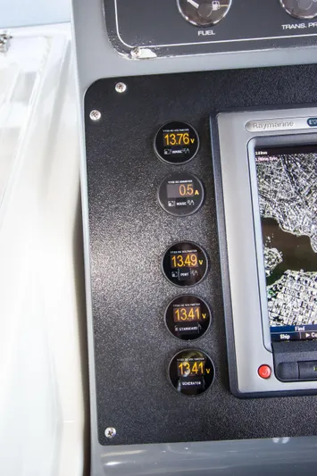 Sparrow Yacht Photos Pics 1995 Tiara Yachts 4000 Express dashboard with gauges and navigation display.