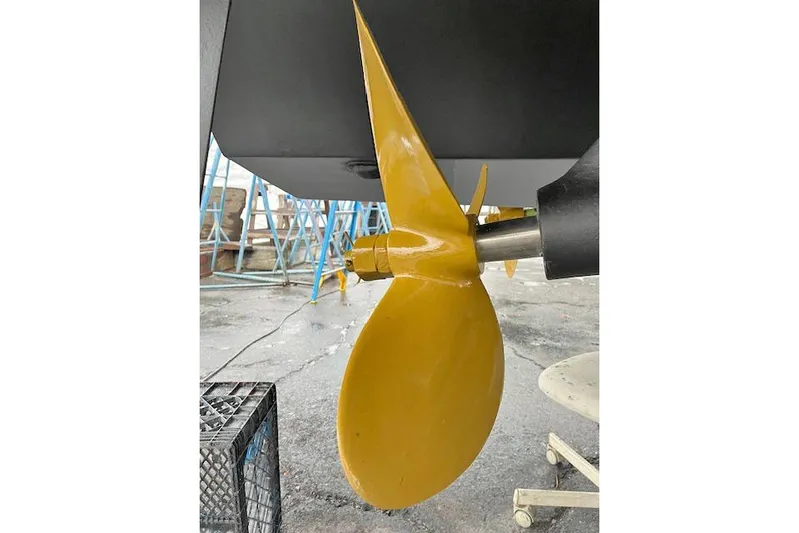 Sparrow Yacht Photos Pics Propeller of 1995 Tiara Yachts 4000 Express, yellow finish, dockside view.