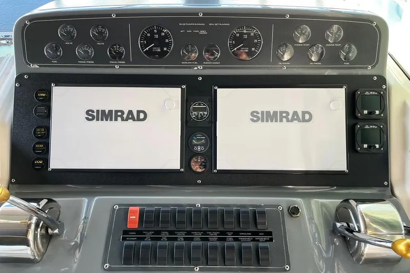 Sparrow Yacht Photos Pics Dashboard of a 1995 Tiara Yachts 4000 Express with Simrad navigation displays.