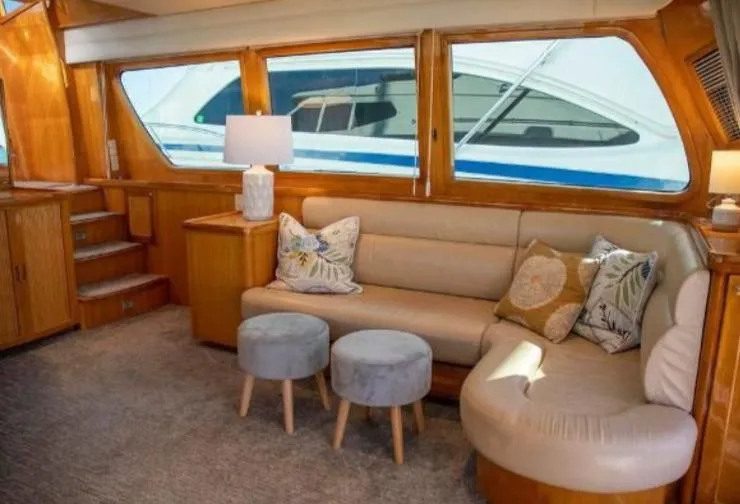 Prudence Yacht Photos Pics Interior of 2005 McKinna 57 Pilothouse yacht with cozy seating and elegant decor.