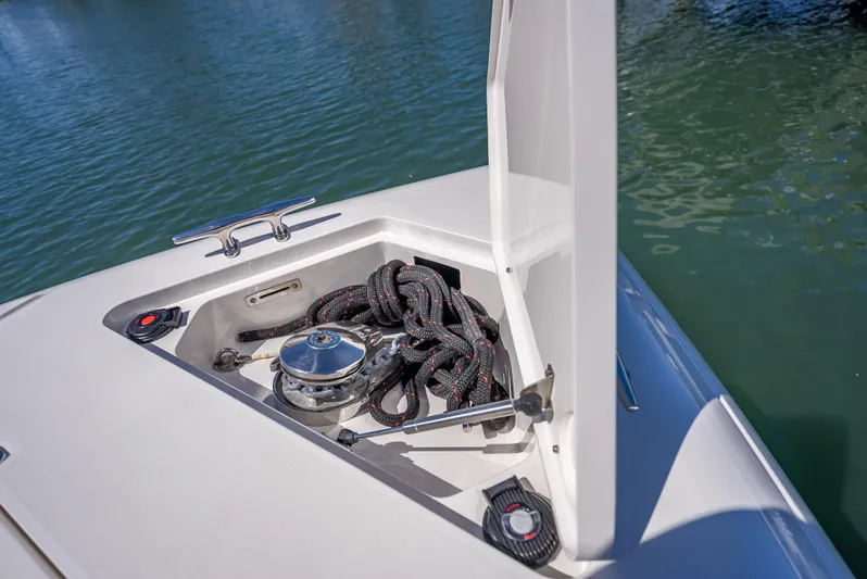  Yacht Photos Pics 2010 Intrepid 370 Open boat anchor compartment with rope and winch.