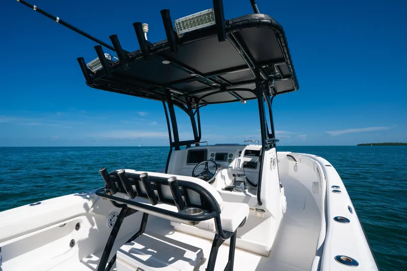  Yacht Photos Pics 2013 Deep Impact 33 boat on open water, featuring sleek design and modern controls.