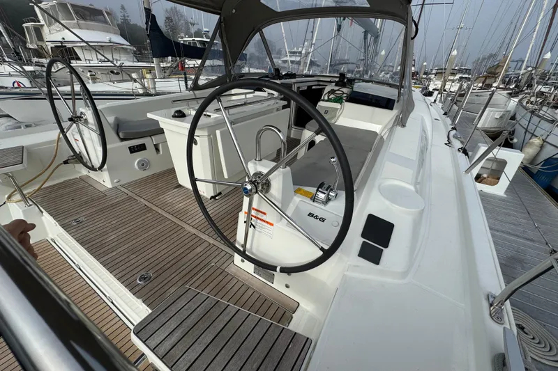 Madras Yacht Photos Pics 2022 Beneteau Oceanis 40.1 yacht cockpit with dual steering wheels and teak decking.