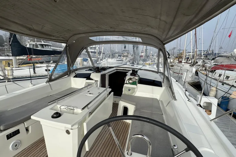 Madras Yacht Photos Pics 2022 Beneteau Oceanis 40.1 yacht cockpit with canopy, docked at marina.