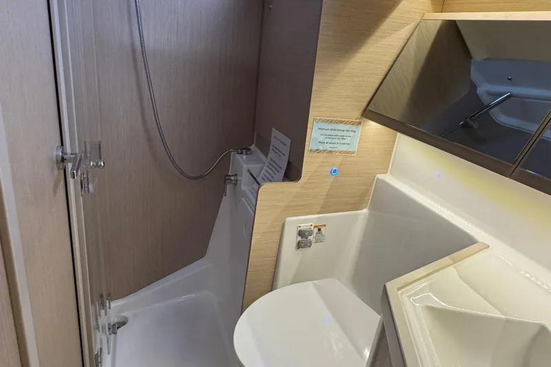 Madras Yacht Photos Pics 2022 Beneteau Oceanis 40.1 bathroom with modern fixtures and wooden accents.