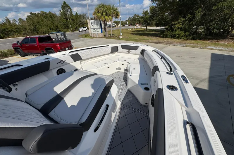  Yacht Photos Pics 2025 Fountain 32 NX boat interior with sleek seating and modern design.