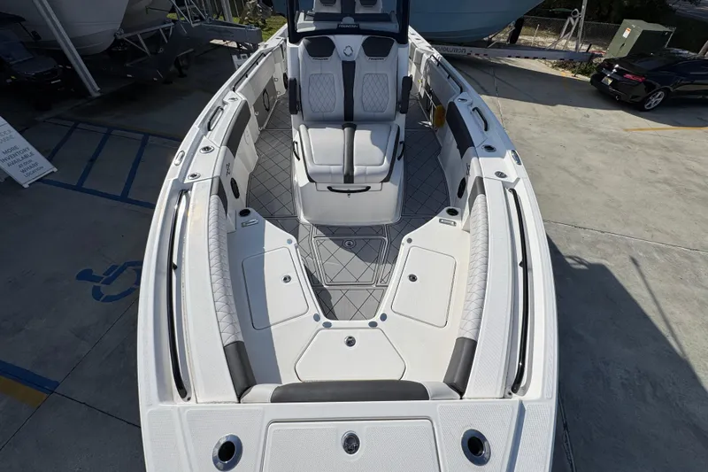  Yacht Photos Pics 2025 Fountain 32 NX boat interior with sleek seating and modern design.
