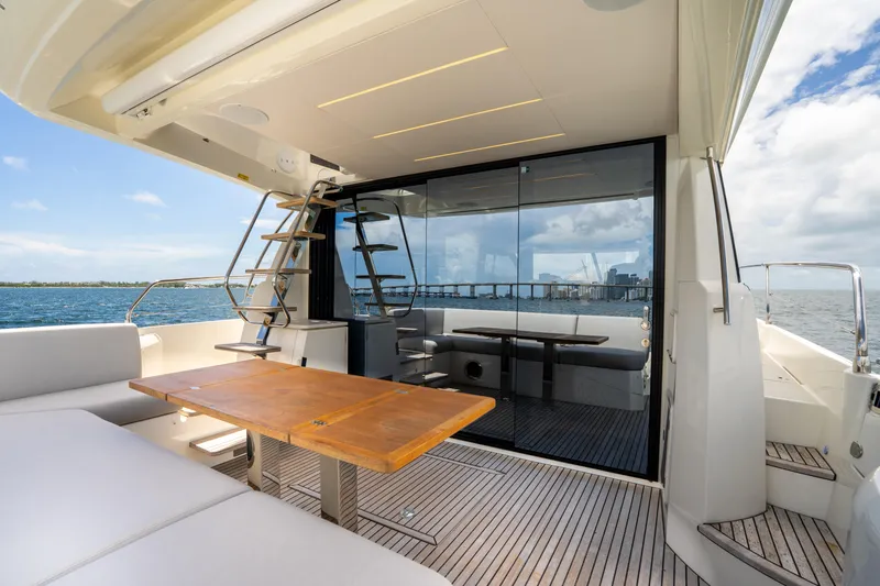 Soiral Yacht Photos Pics Luxurious 2023 Prestige 520 yacht with spacious deck and modern interior design.