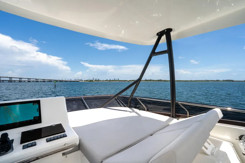 Soiral Yacht Photos Pics Luxury 2023 Prestige 520 yacht helm with ocean view and navigation system.