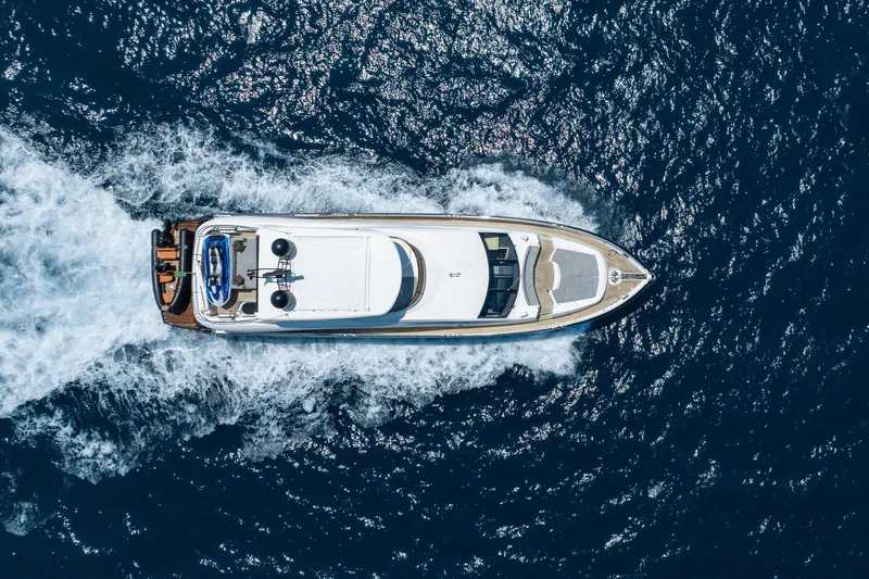 Mello Yacht Photos Pics Aerial view of 2008 Sunseeker 86 Yacht cruising on open sea.