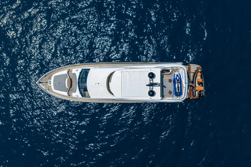 Mello Yacht Photos Pics Aerial view of 2008 Sunseeker 86 Yacht on deep blue ocean waters.